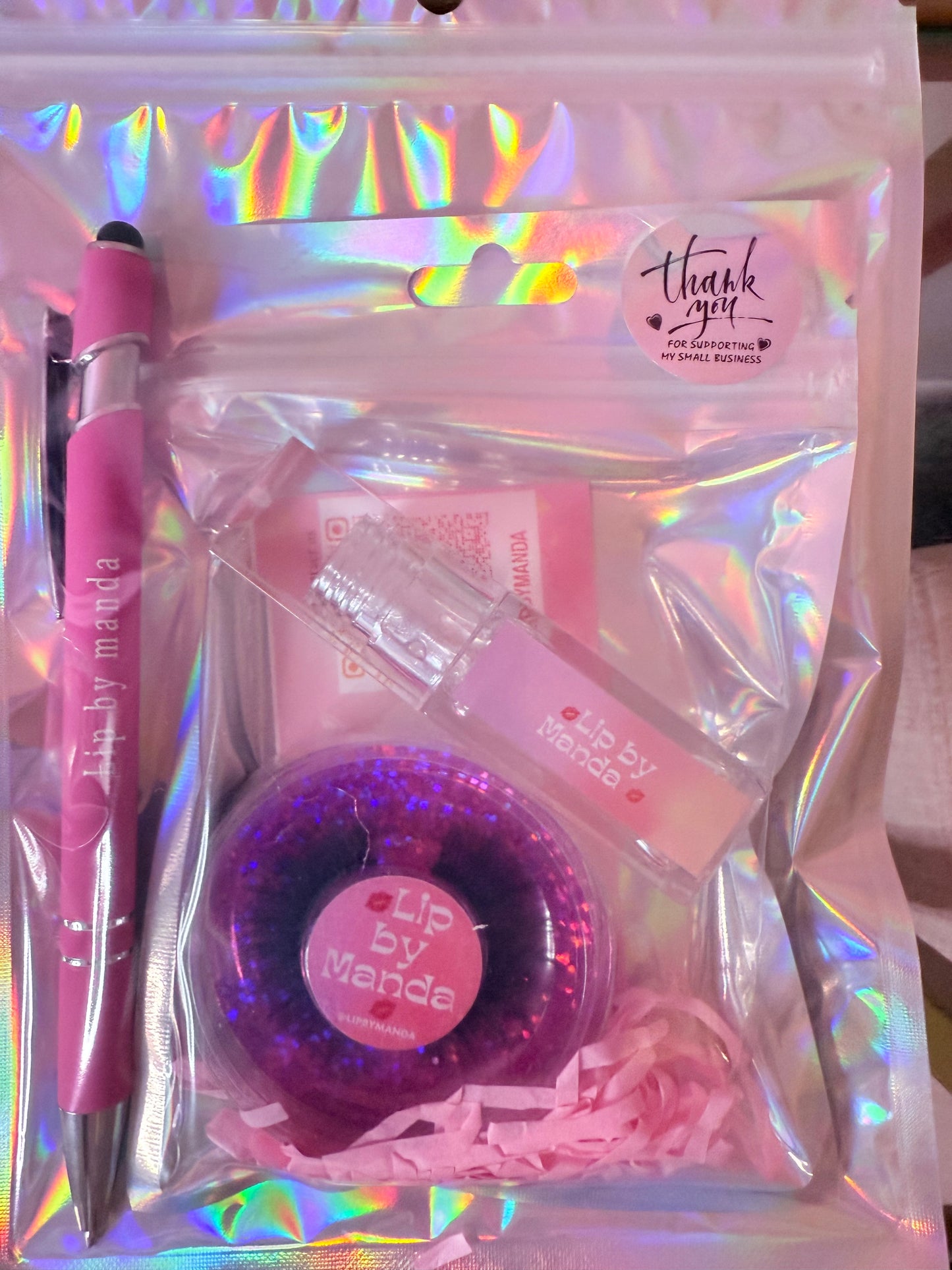Lipbymanda gloss , lashes , ink pen