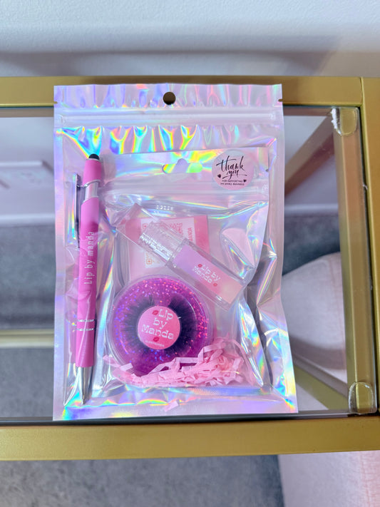 Lipbymanda gloss , lashes , ink pen